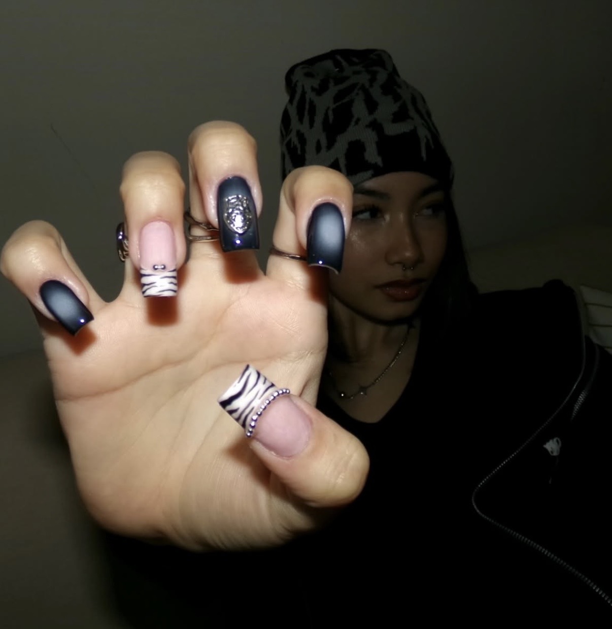 Long black chrome nails with zebra print French tips by KVP nails